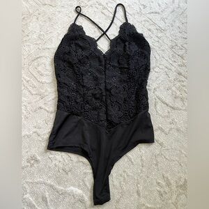 black lacy bodysuit
